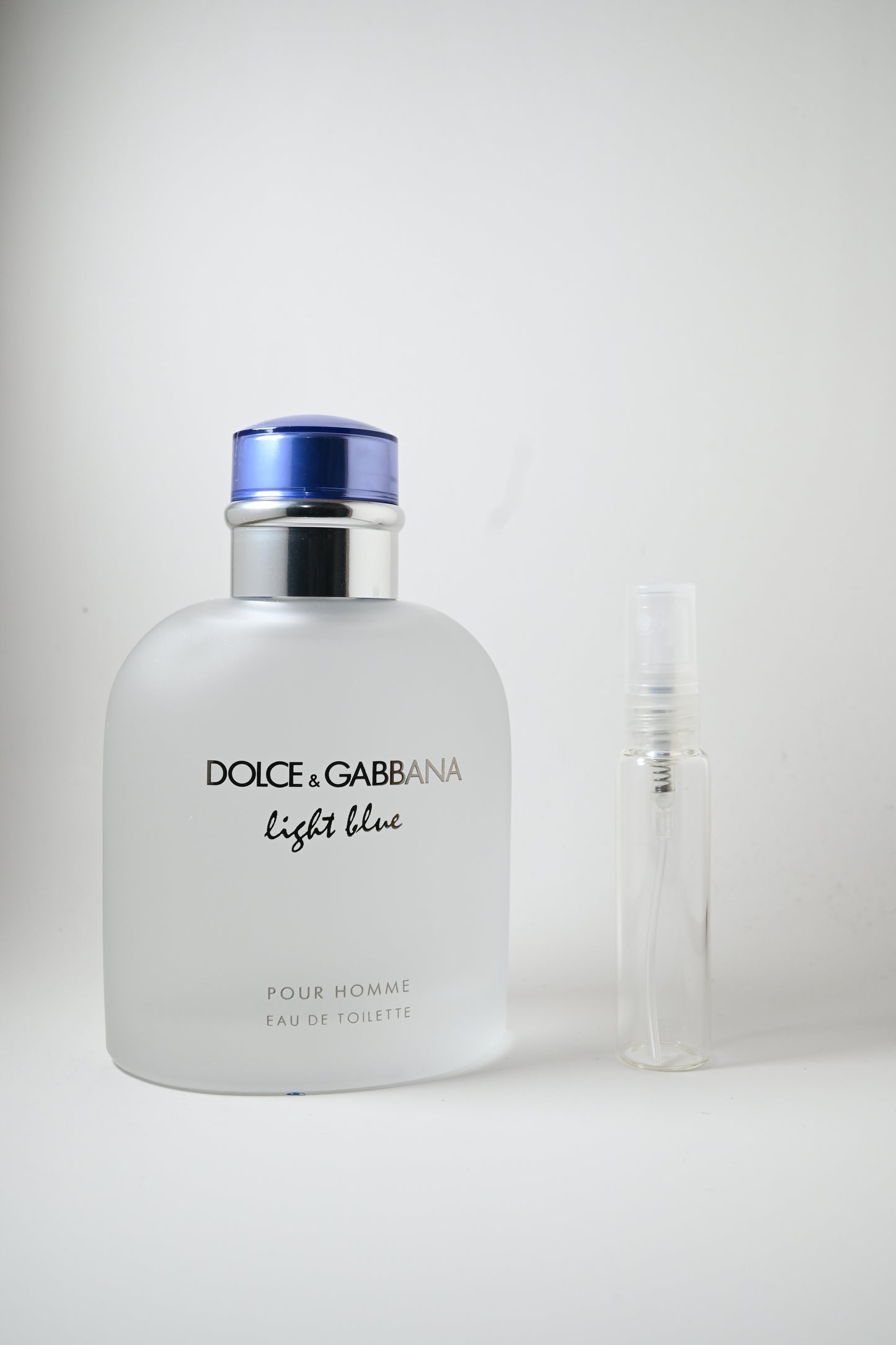 Dolce & Gabbana Light Blue Bottle Next to 10ML Decant - Perfumes de Adrian