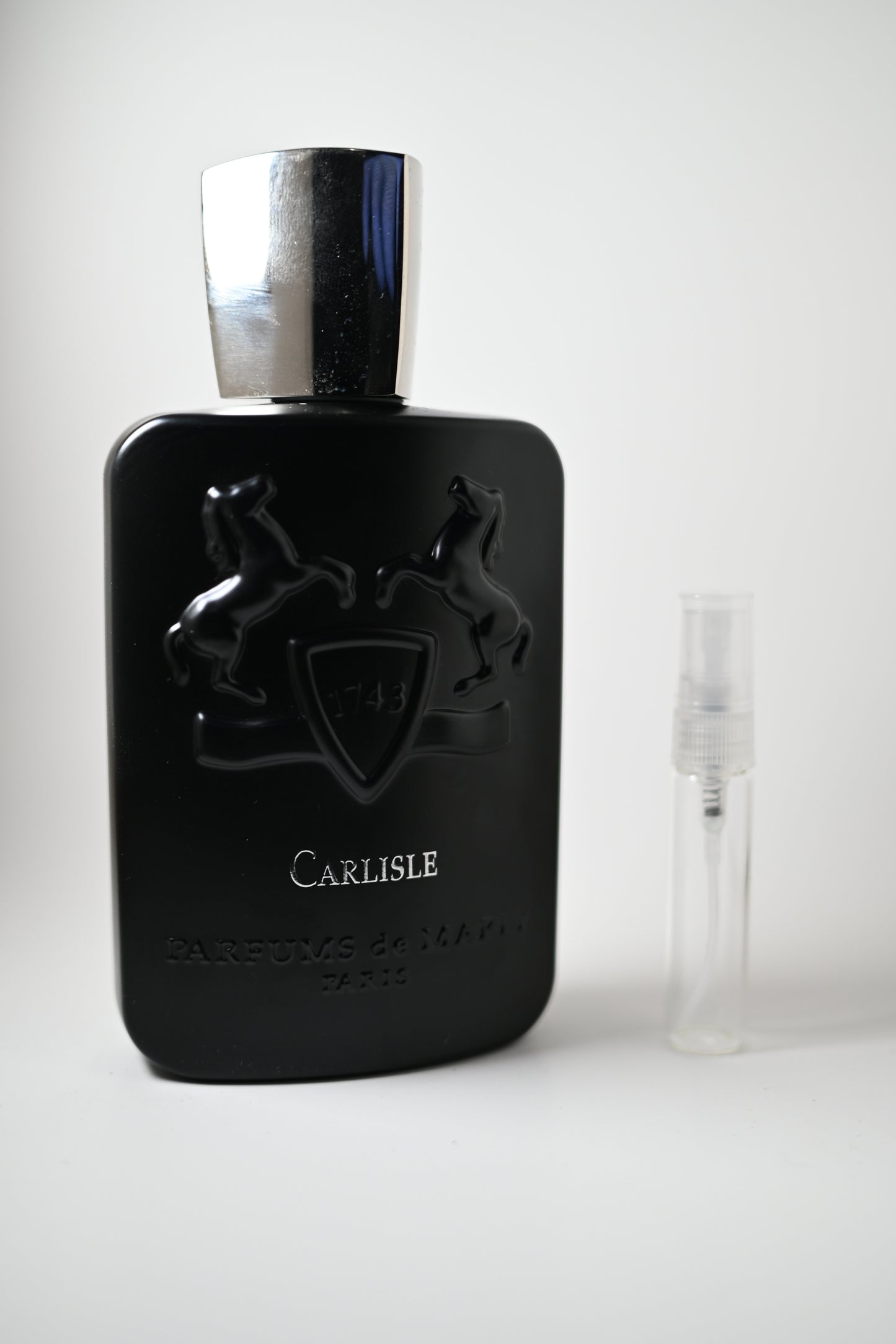 Carlisle Bottle Next to 5ML Decant - Perfumes de Adrian