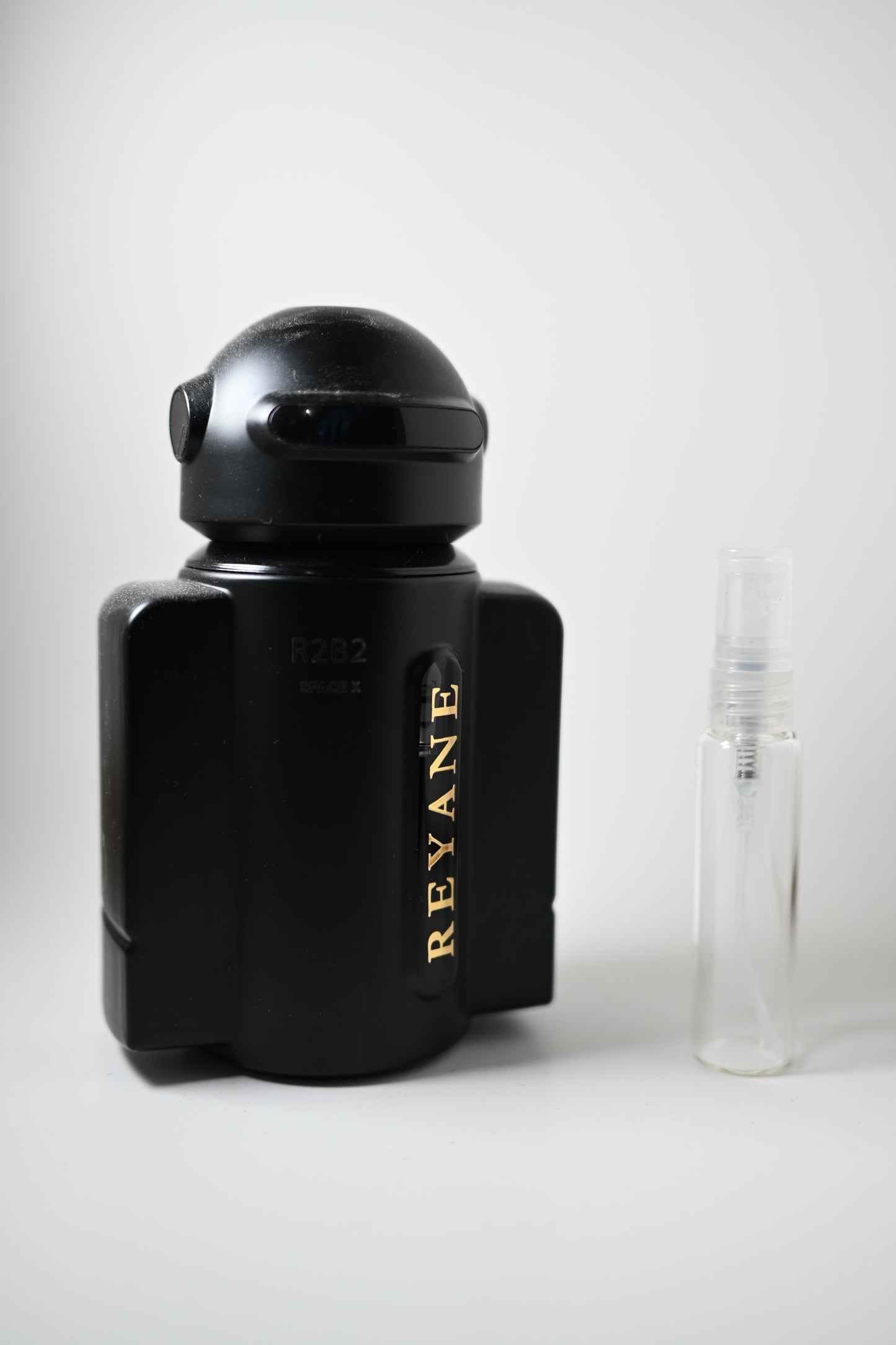 Reyane Tradition R2B2 Space X Bottle Next to 10ML Decant – Perfumes de Adrian