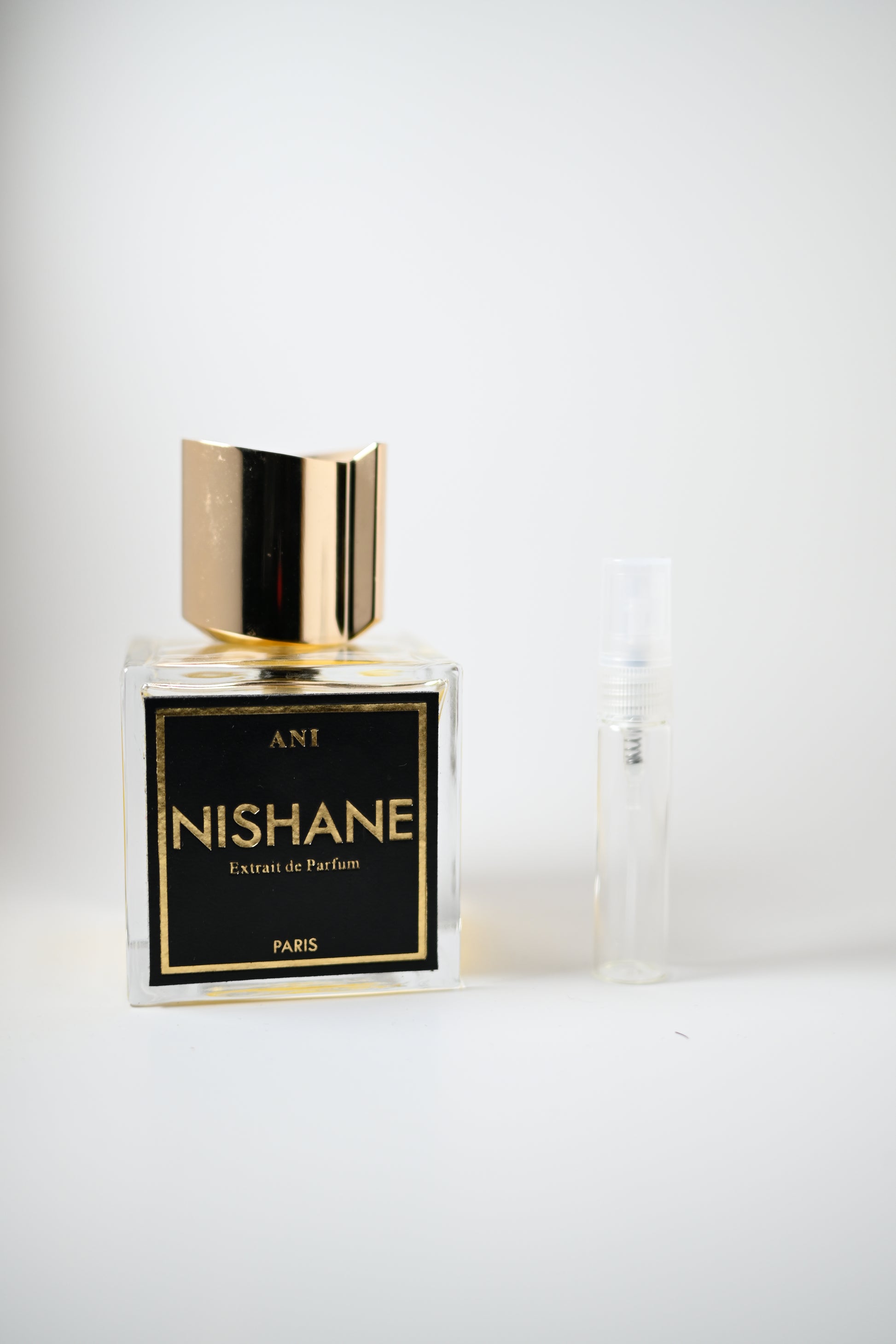 Ani Nishane Bottle Next to 5ML Decant - Perfumes de Adrian