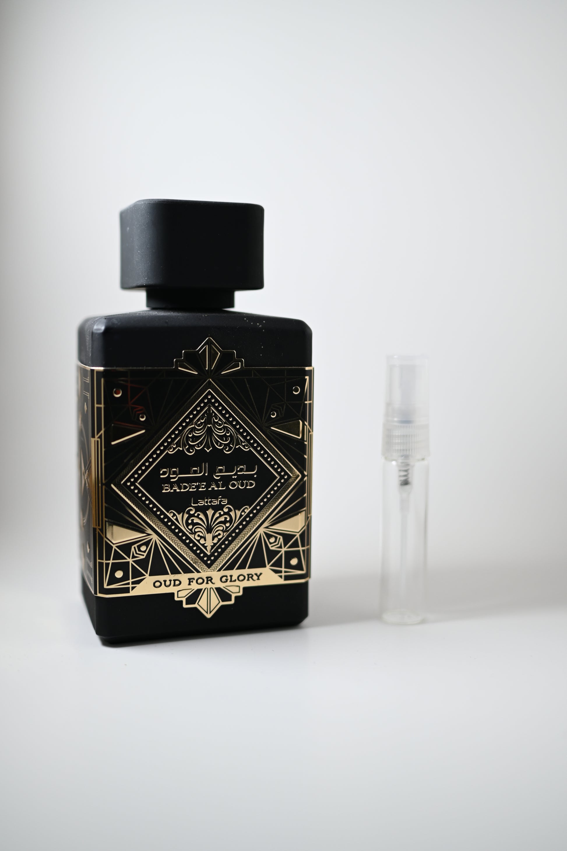 Lattafa Badee Al Oud Bottle Next to 5ML Decant - Perfumes de Adrian