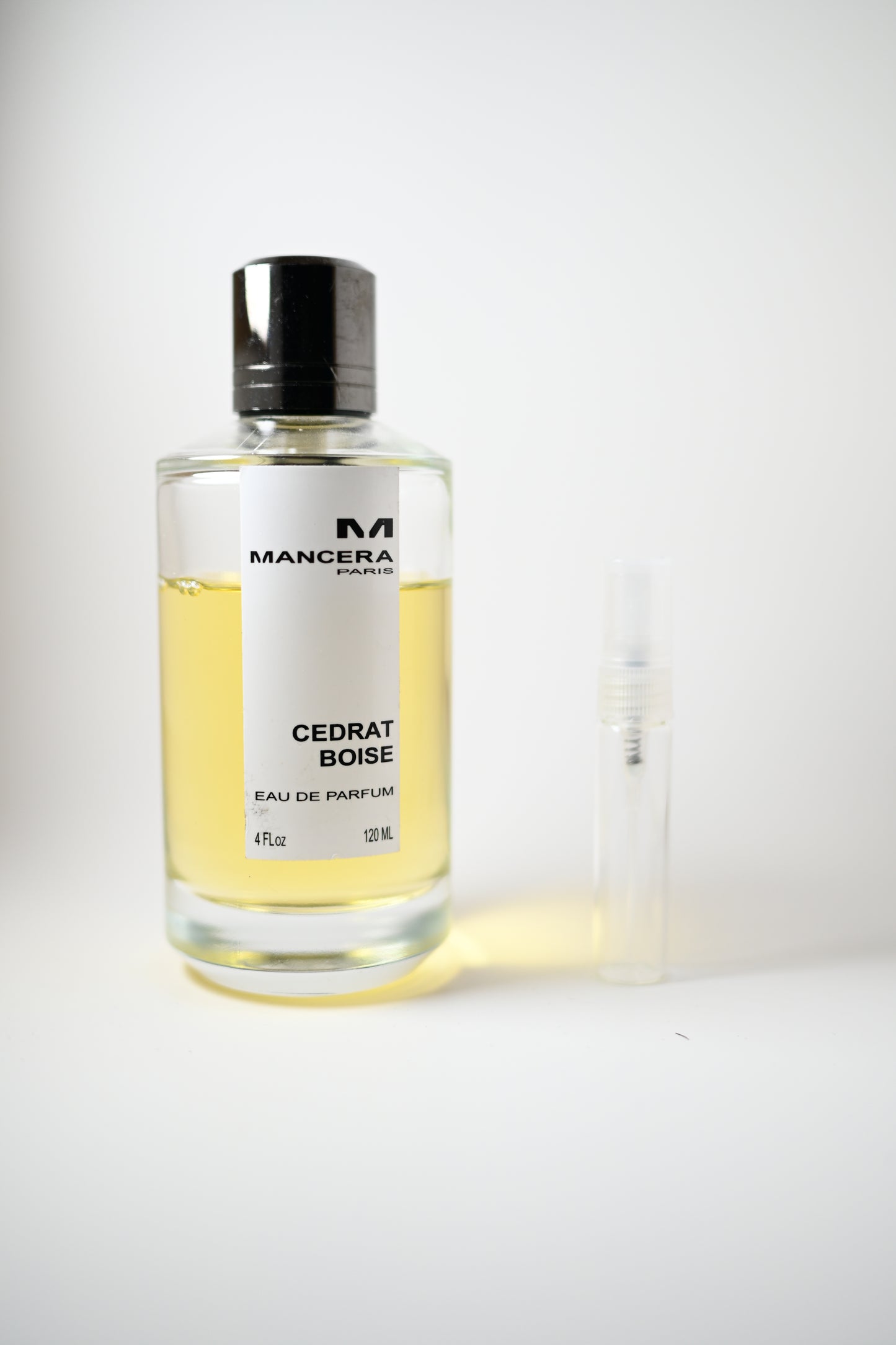 Cedrat Boise Bottle Next to 5ML Decant - Perfumes de Adrian